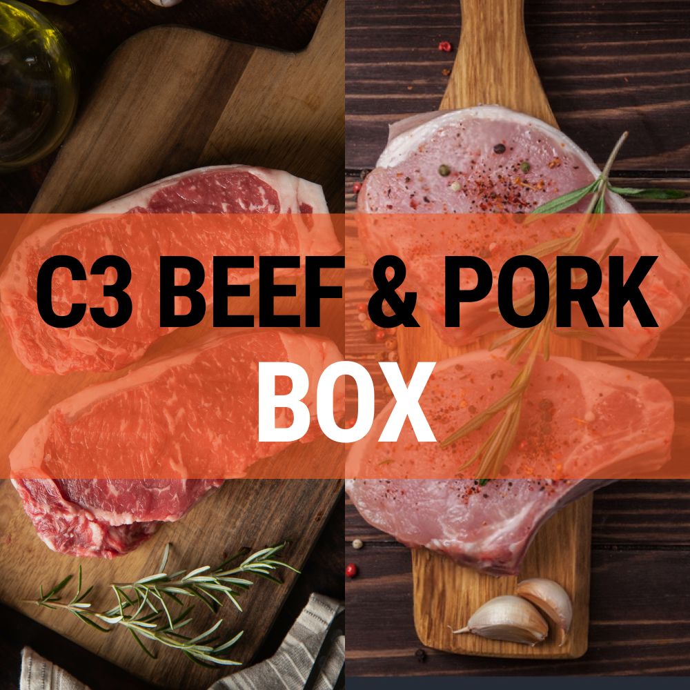 Raw beef and pork on wooden boards with 'C3 BEEF & PORK BOX' text overlay.